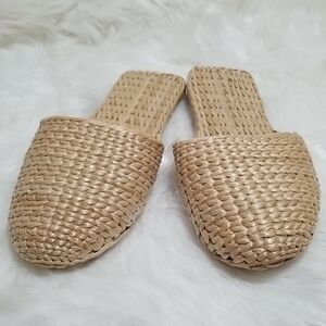 Hand woven straw spa slippers.